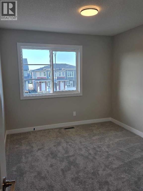 187 Lanark Gate SE, Airdrie, Alberta  T4A 3R7 - Photo 17 - A2334211