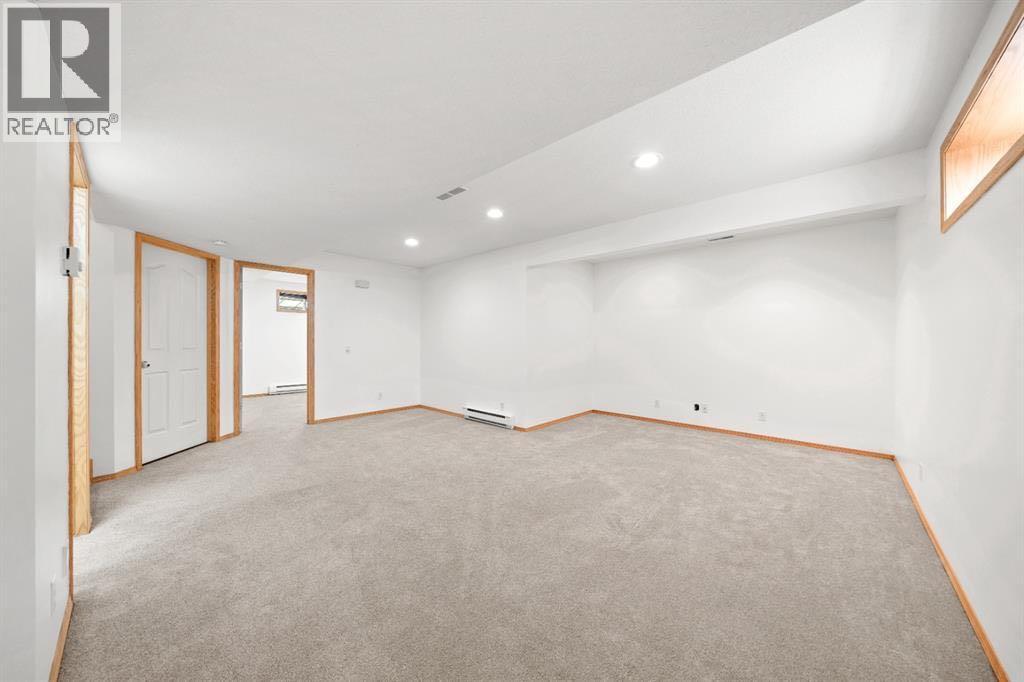 41 Bow Ridge Drive, Cochrane, Alberta  T4C 1V5 - Photo 17 - A2323320