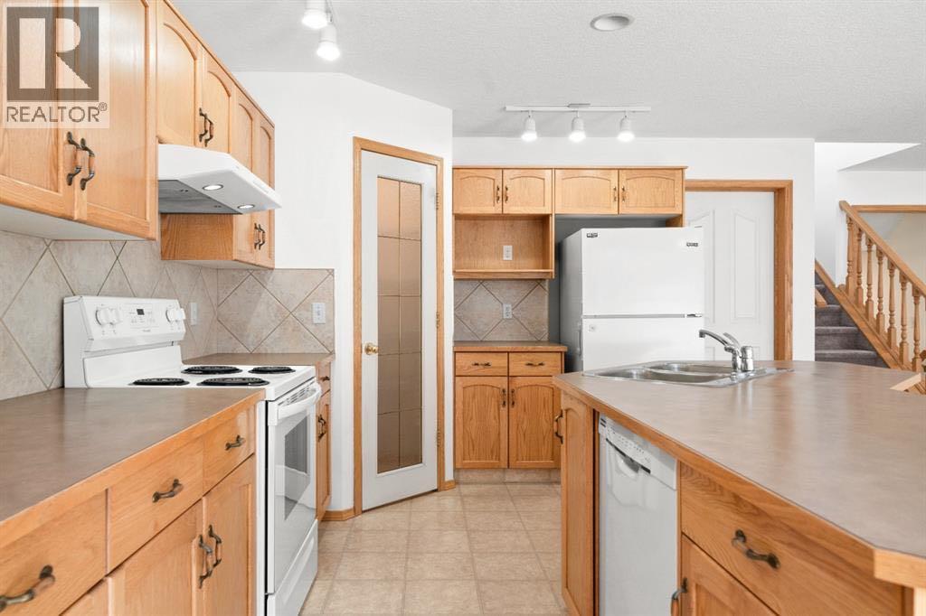 41 Bow Ridge Drive, Cochrane, Alberta  T4C 1V5 - Photo 6 - A2323320
