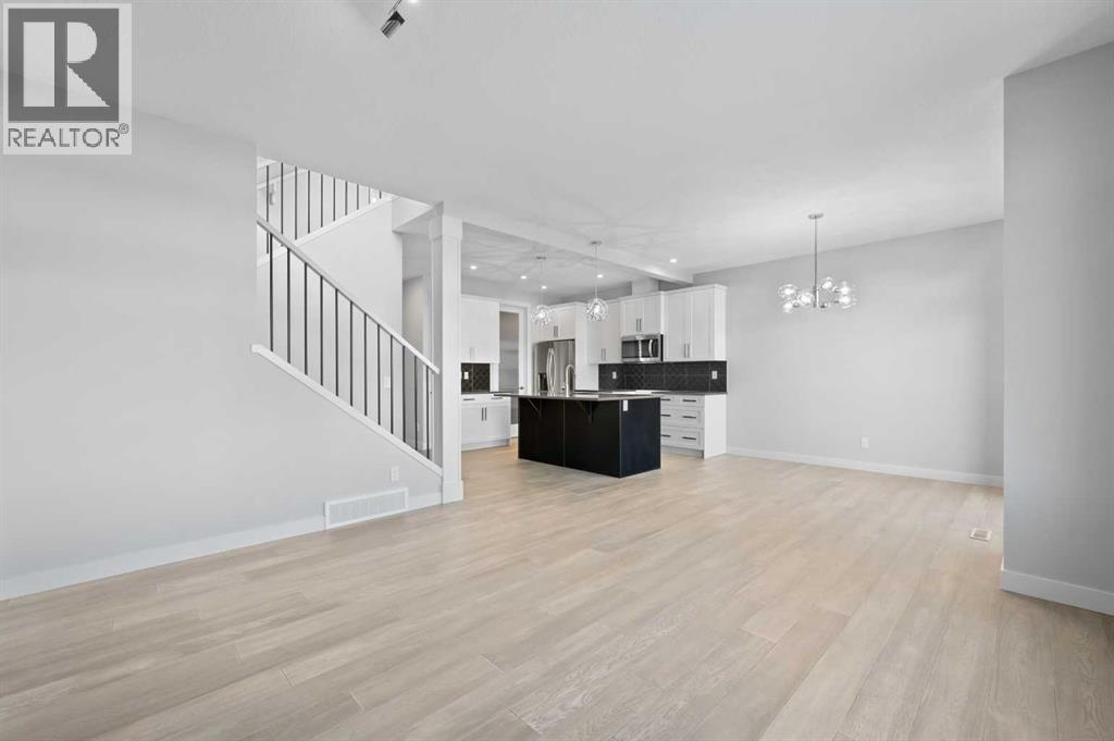 67 Agate Road, Cochrane, Alberta  T4C 3B9 - Photo 24 - A2329380