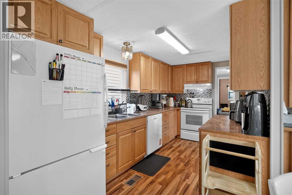 913 Spring Haven Court SE, Airdrie, Alberta  T4A 1B4 - Photo 9 - A2332249