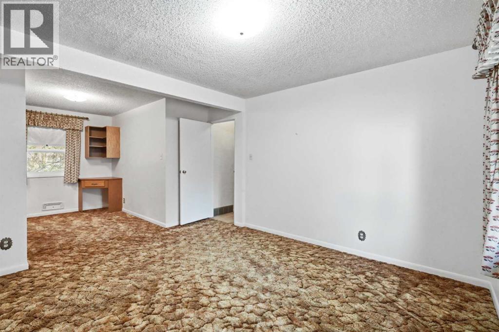 13 Tipton Place NW, Calgary, Alberta  T2K 3L6 - Photo 16 - A2333948