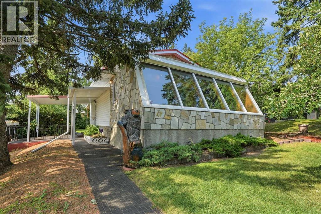 13 Tipton Place NW, Calgary, Alberta  T2K 3L6 - Photo 2 - A2333948