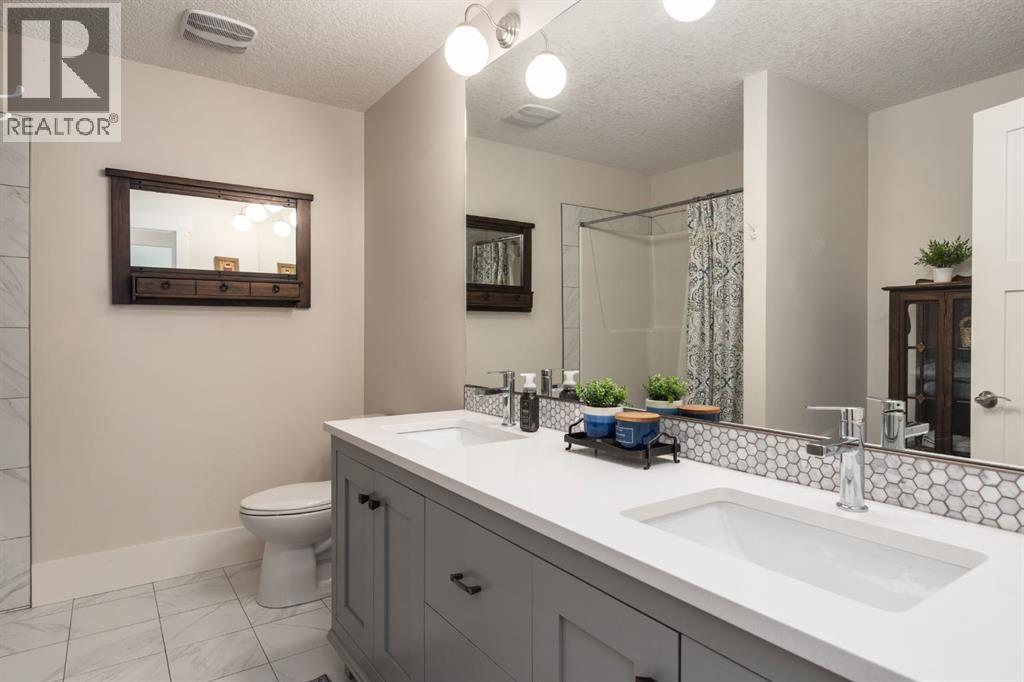 313 Centre Avenue SE, Airdrie, Alberta  T4B 1H6 - Photo 26 - A2327621