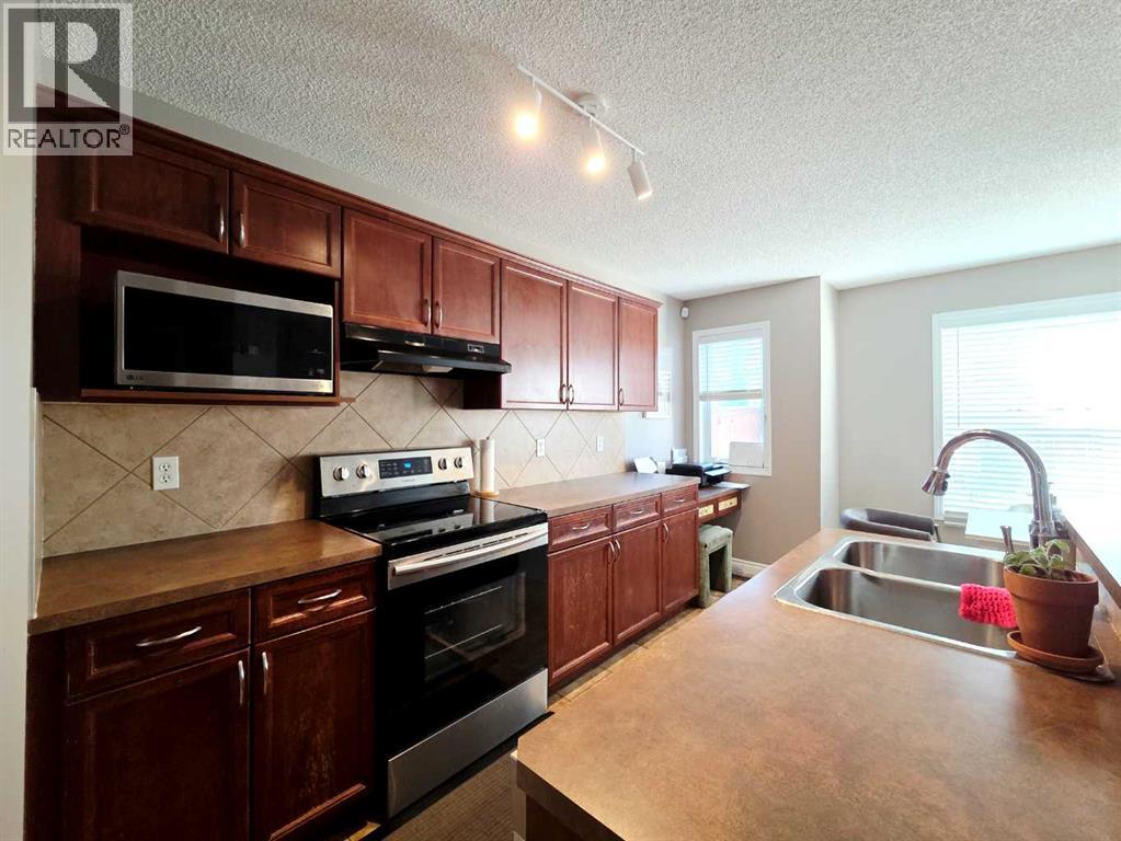 48 Covepark Place Ne, Calgary, Alberta  T3K 5Z8 - Photo 5 - A2328546