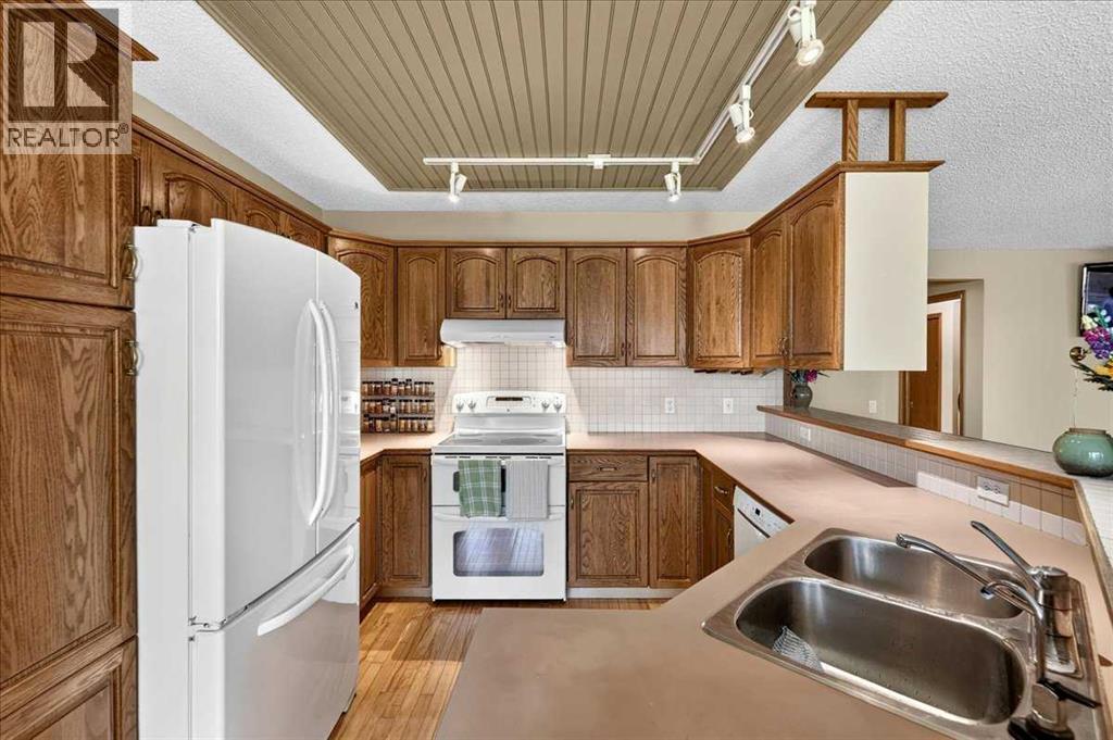 14 Hawkdale Gate NW, Calgary, Alberta  T3G 2W6 - Photo 21 - A2326490