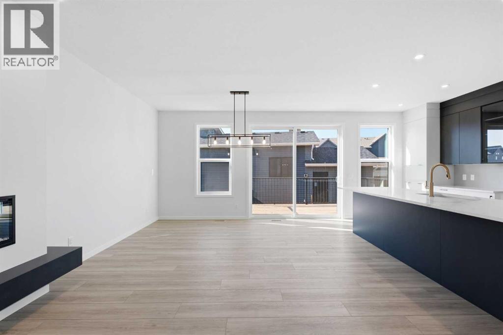572 Belmont Heath SW, Calgary, Alberta  T2X 4H4 - Photo 8 - A2333478