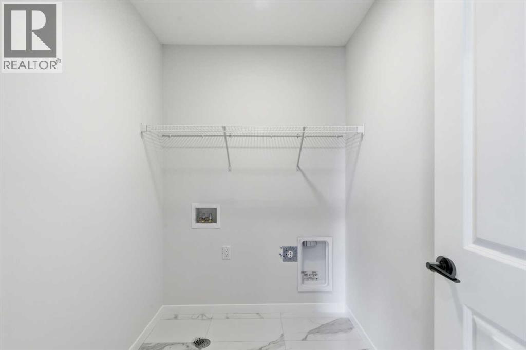 572 Belmont Heath SW, Calgary, Alberta  T2X 4H4 - Photo 28 - A2333478