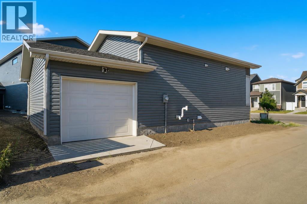 572 Belmont Heath SW, Calgary, Alberta  T2X 4H4 - Photo 46 - A2333478