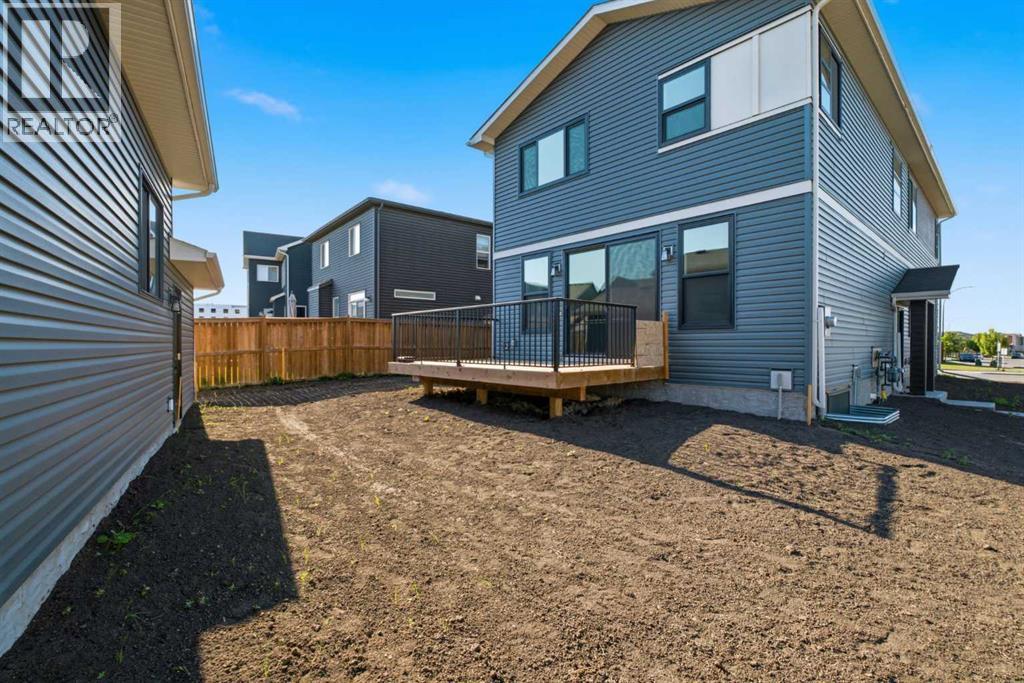 572 Belmont Heath SW, Calgary, Alberta  T2X 4H4 - Photo 45 - A2333478