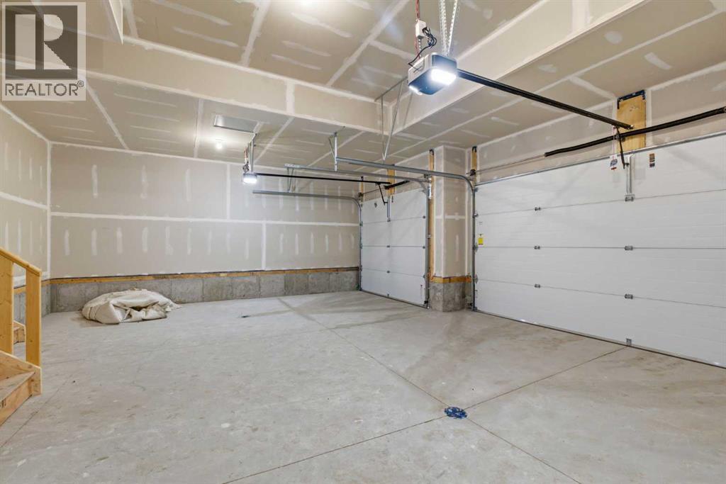 572 Belmont Heath SW, Calgary, Alberta  T2X 4H4 - Photo 37 - A2333478