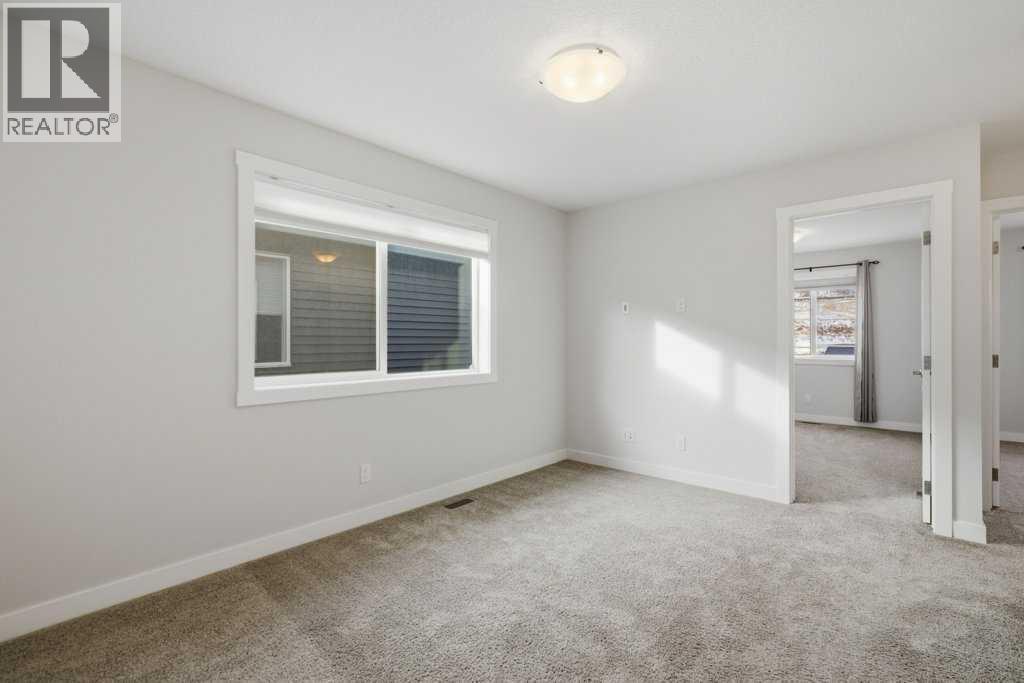 311 Wolf Creek Way SE, Calgary, Alberta  T2X 4Y8 - Photo 29 - A2290796