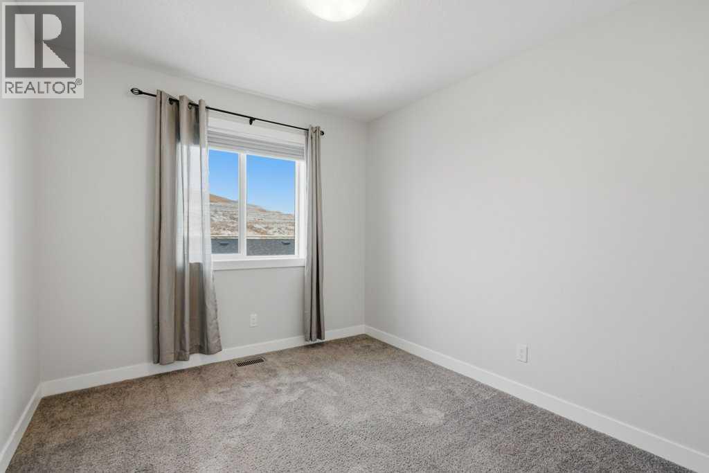 311 Wolf Creek Way SE, Calgary, Alberta  T2X 4Y8 - Photo 22 - A2290796