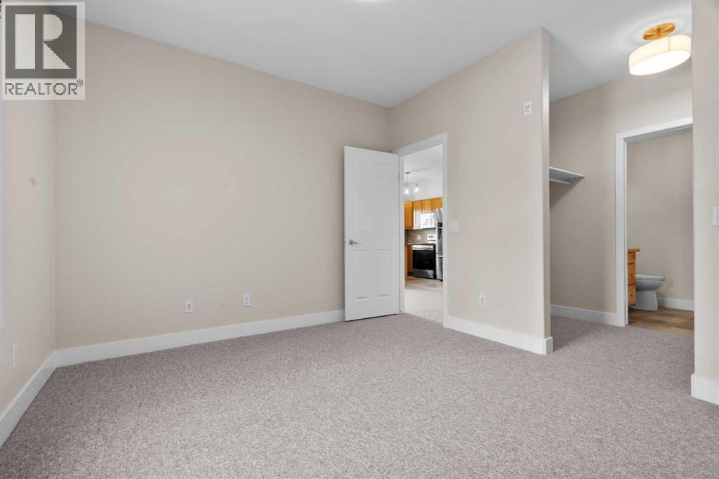 4203, 92 Crystal Shores Road, Okotoks, Alberta  T1S 2N2 - Photo 20 - A2331376