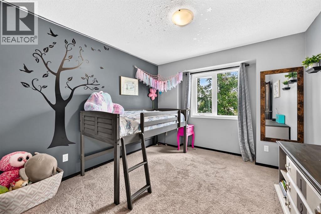81 Sandalwood Court NW, Calgary, Alberta  T3K 4B7 - Photo 33 - A2331272