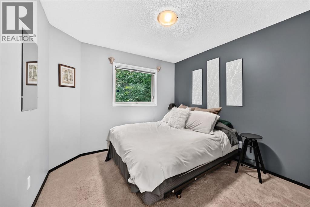 81 Sandalwood Court NW, Calgary, Alberta  T3K 4B7 - Photo 32 - A2331272