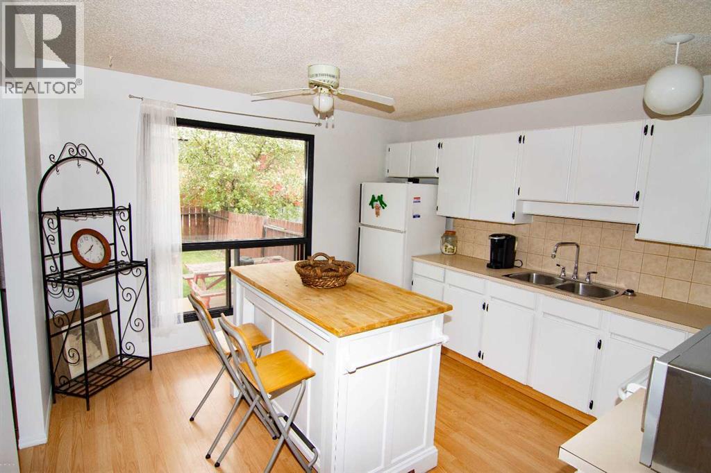 5502 Temple Road NE, Calgary, Alberta  T1Y 3B2 - Photo 5 - A2314706