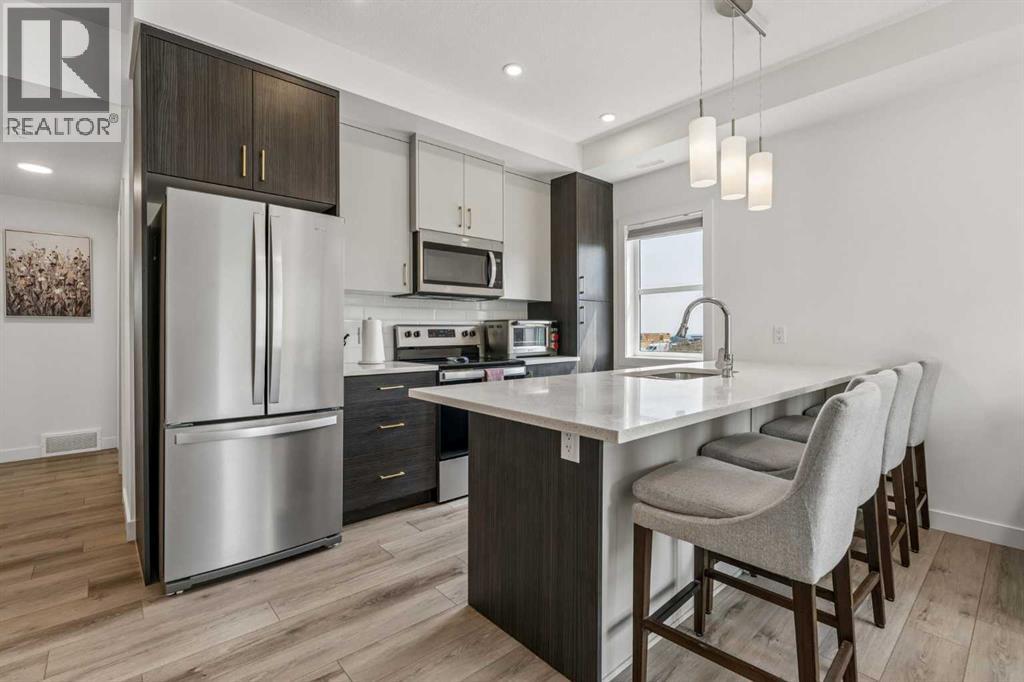 103 Spring Creek Common SW, Calgary, Alberta T3H 6E2 - Photo 4 - A2334087