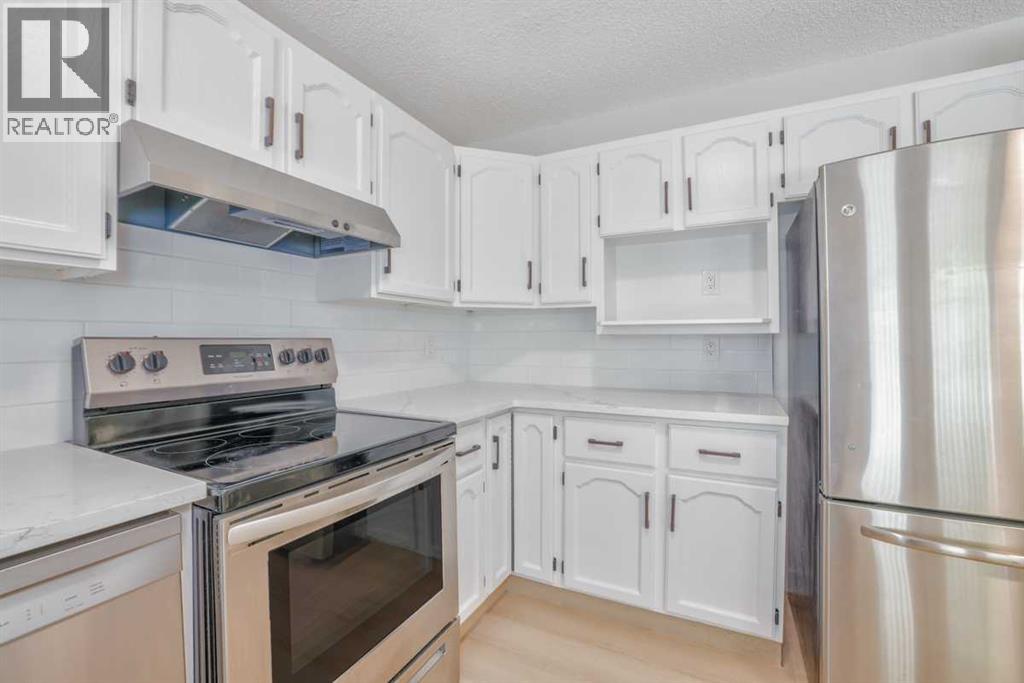 208 Macewan Valley Road NW, Calgary, Alberta  T3K 3P1 - Photo 12 - A2328318