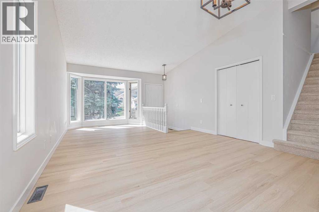 208 Macewan Valley Road NW, Calgary, Alberta  T3K 3P1 - Photo 5 - A2328318