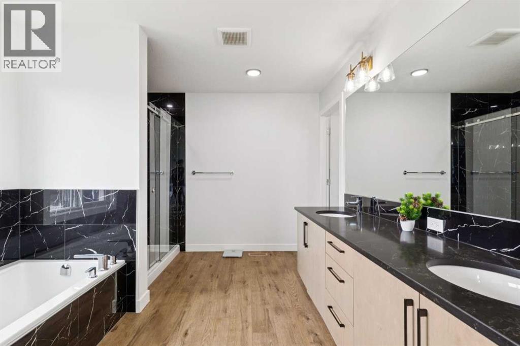 814 Bluerock Way SW, Calgary, Alberta  T2Y 0S4 - Photo 24 - A2313536