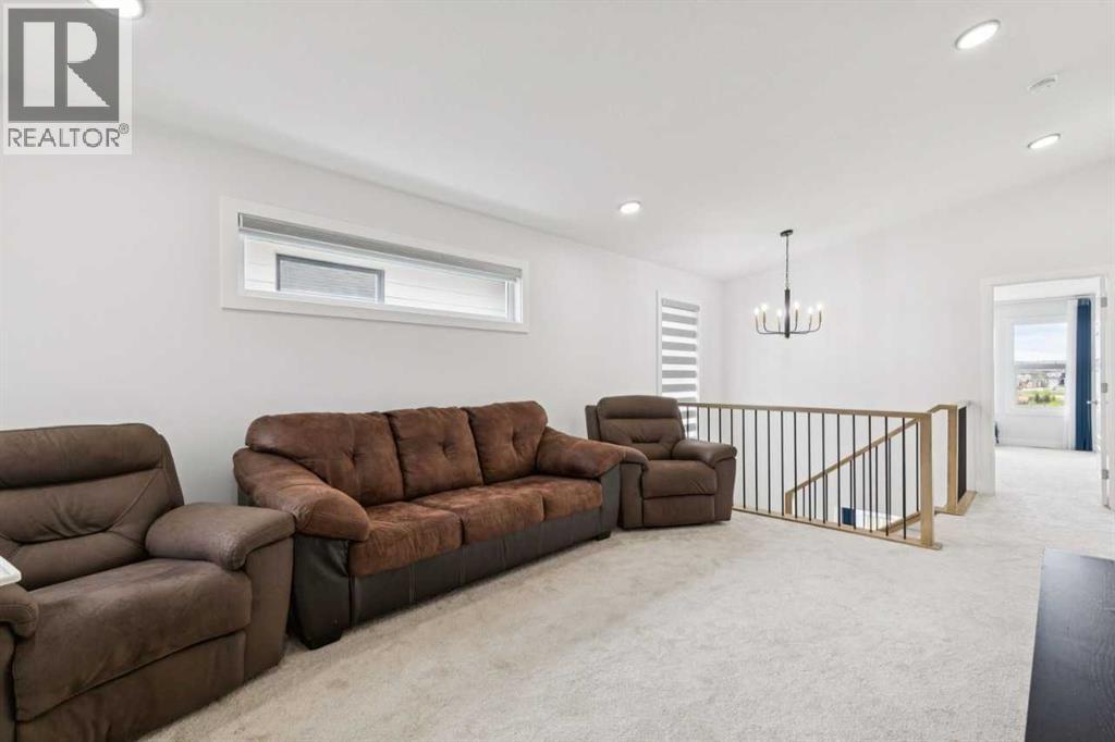 814 Bluerock Way SW, Calgary, Alberta  T2Y 0S4 - Photo 34 - A2313536