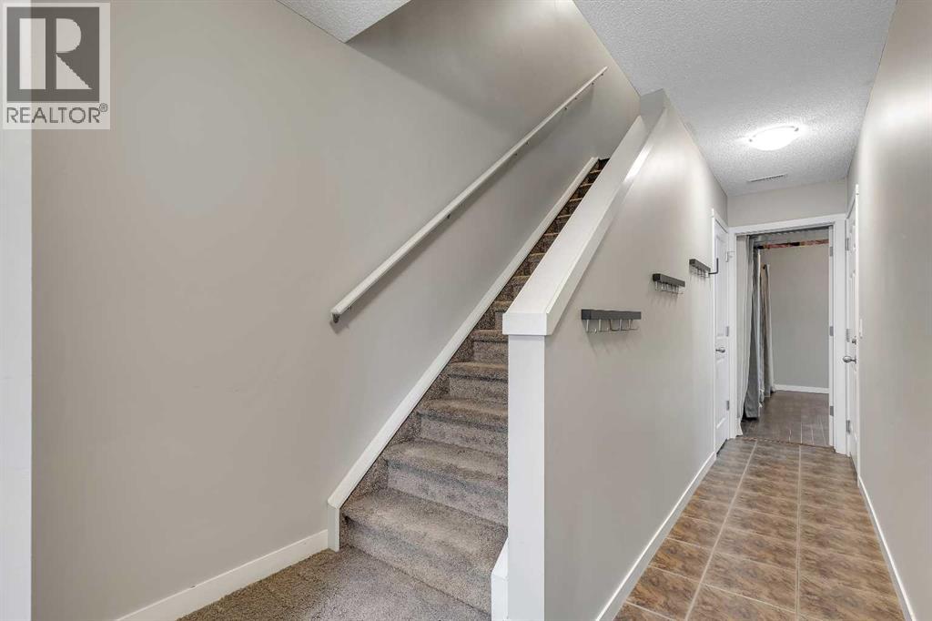 401 Copperpond Landing SE, Calgary, Alberta  T2G 1Z6 - Photo 6 - A2318569