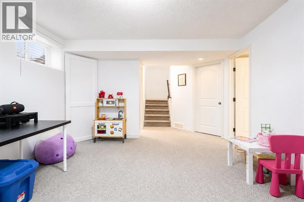 821 Auburn Bay Boulevard SE, Calgary, Alberta  T3M 0H5 - Photo 34 - A2324832
