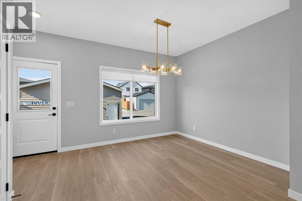 22 Chinook Winds Court SW, Airdrie, Alberta  T4B 5X6 - Photo 12 - A2334349