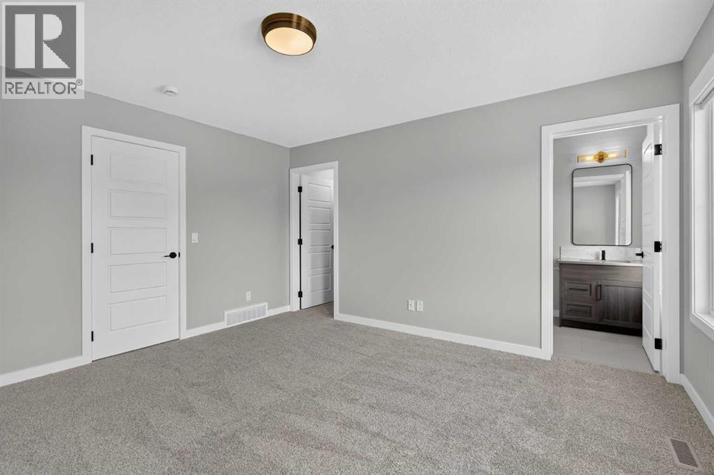 22 Chinook Winds Court SW, Airdrie, Alberta  T4B 5X6 - Photo 21 - A2334349