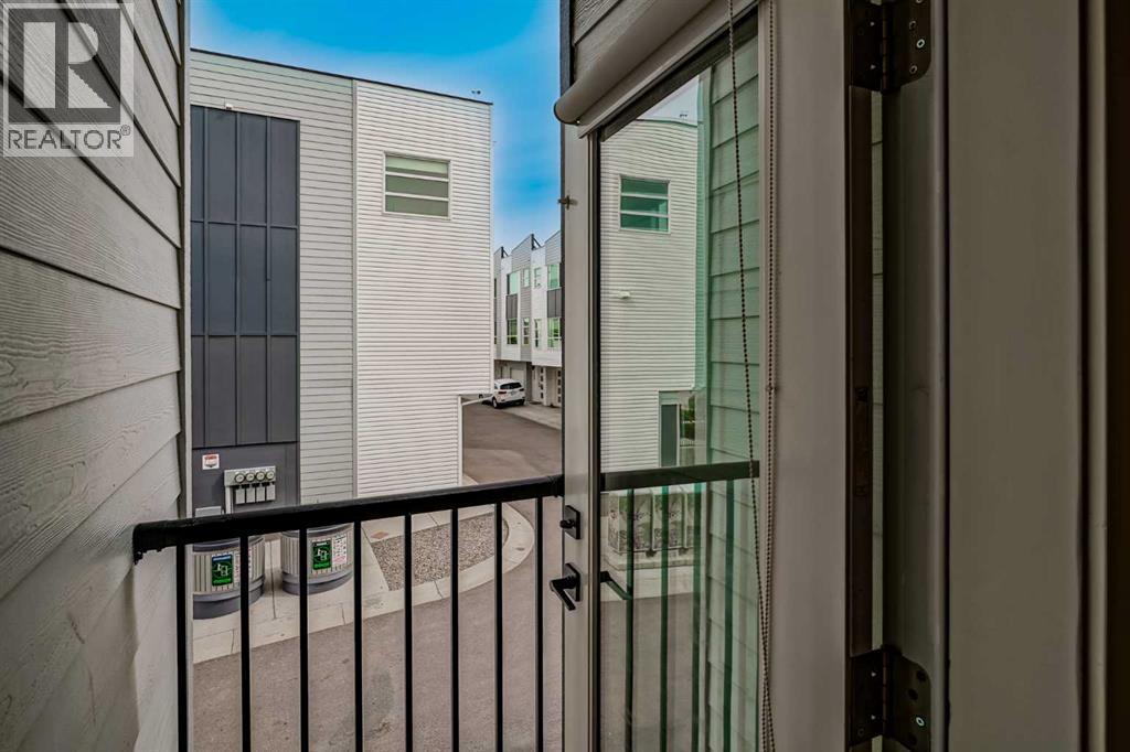 202, 101 Panatella Square NW, Calgary, Alberta  T3K 2R9 - Photo 13 - A2333315
