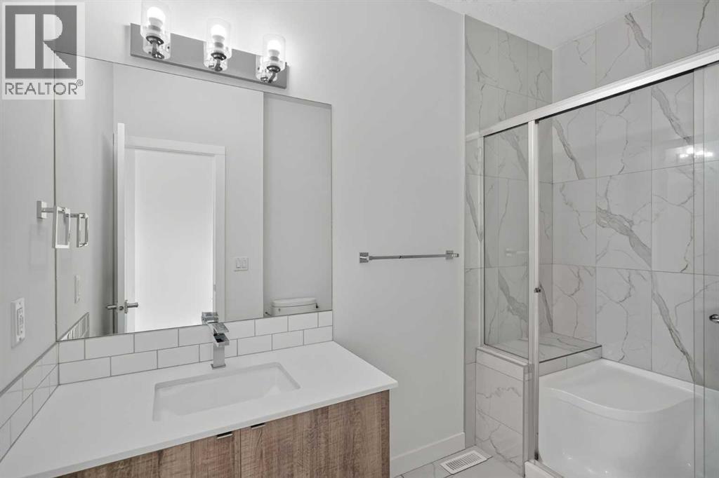 202, 101 Panatella Square NW, Calgary, Alberta  T3K 2R9 - Photo 21 - A2333315