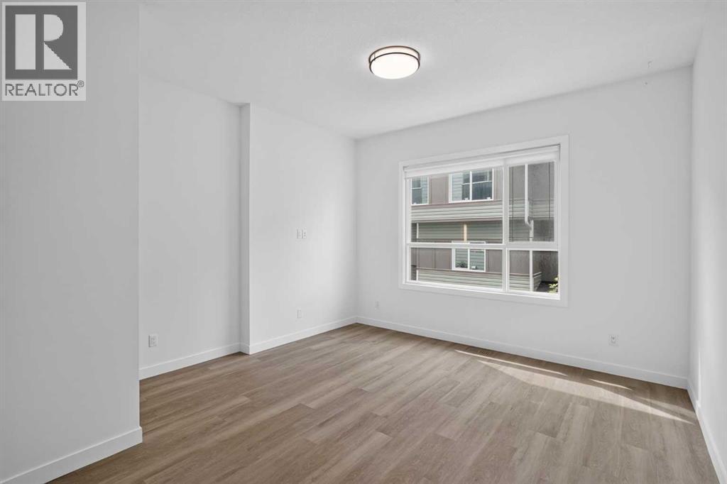 202, 101 Panatella Square NW, Calgary, Alberta  T3K 2R9 - Photo 5 - A2333315