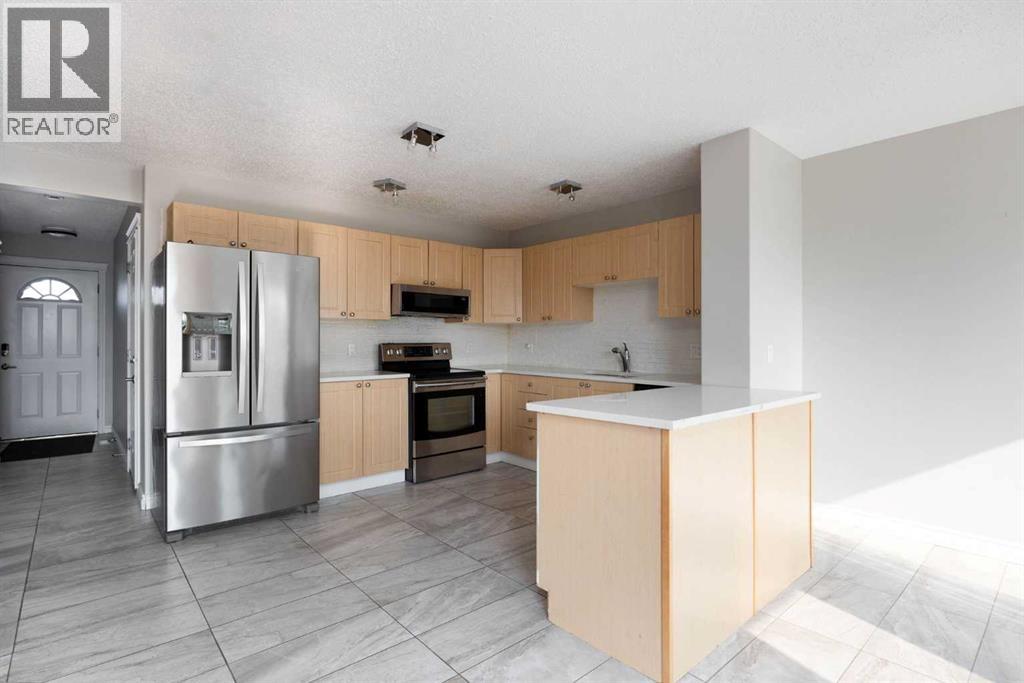 136 Kodiak Crescent, Fort Mcmurray, Alberta  T9K 2L9 - Photo 7 - A2331519