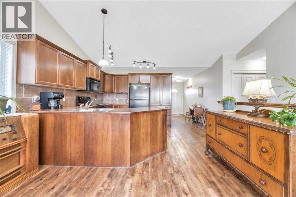 531 Country Meadows Way, Diamond Valley, Alberta  T0L 2A0 - Photo 5 - A2330486