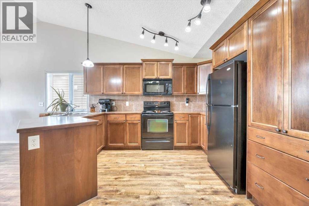 531 Country Meadows Way, Diamond Valley, Alberta  T0L 2A0 - Photo 4 - A2330486