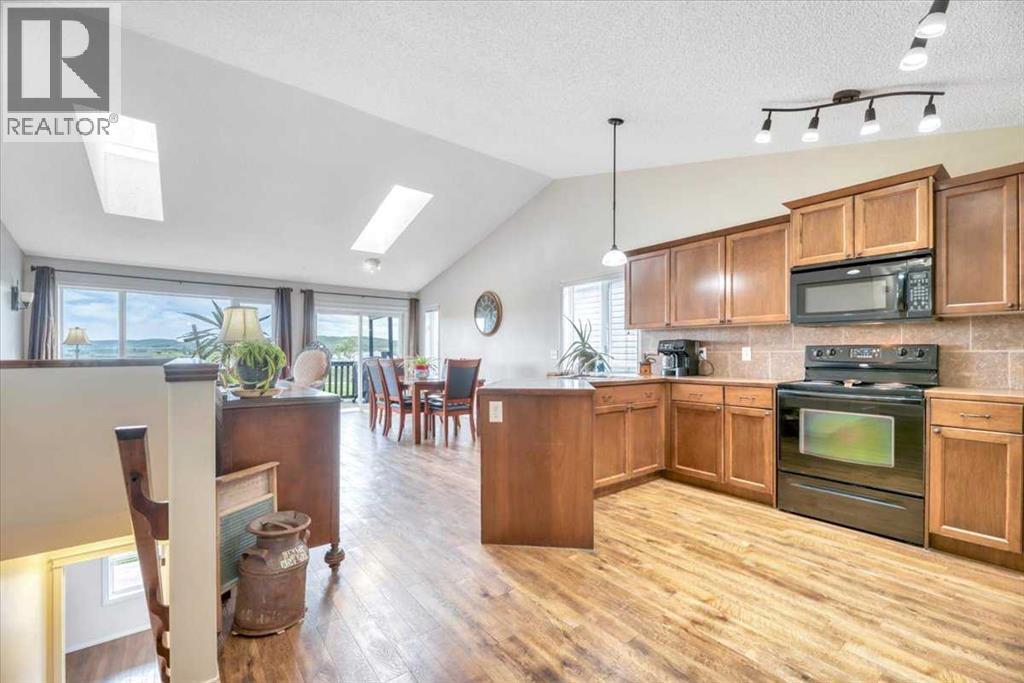 531 Country Meadows Way, Diamond Valley, Alberta  T0L 2A0 - Photo 7 - A2330486