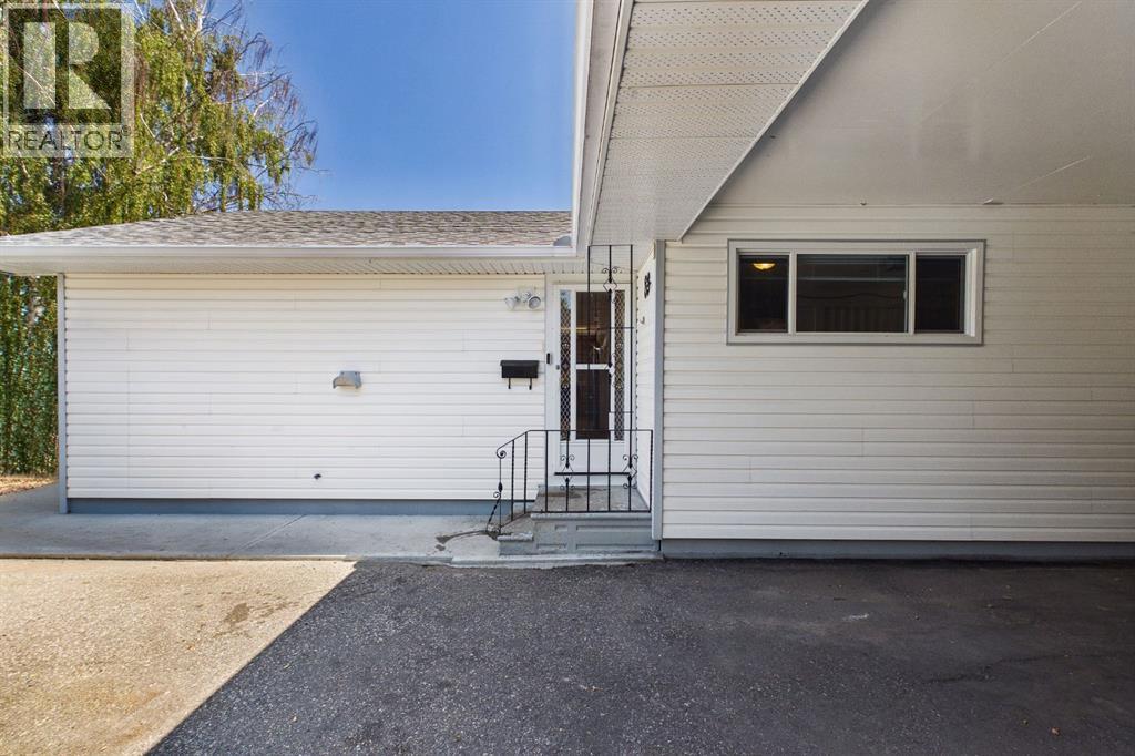 83 Westover Drive SW, Calgary, Alberta  T3C 2S7 - Photo 4 - A2333296