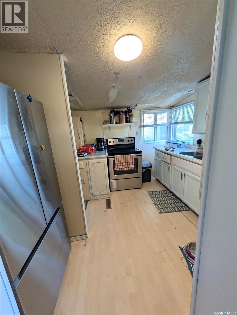 309 6th Avenue Nw, Swift Current, Saskatchewan S9H 0X9 - Photo 6 - SK044323