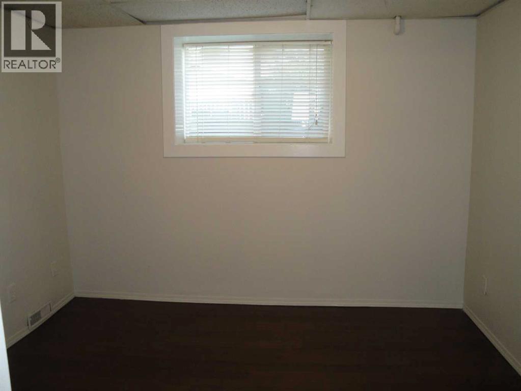 31 Huntford Road NE, Calgary, Alberta  T2K 3Y8 - Photo 25 - A2332760