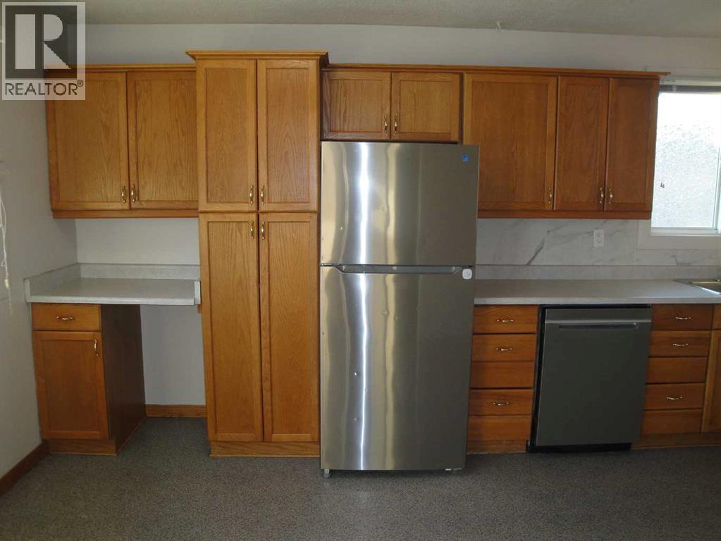 31 Huntford Road NE, Calgary, Alberta  T2K 3Y8 - Photo 8 - A2332760