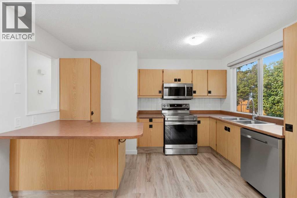 731 Queensland Drive SE, Calgary, Alberta  T2J 4S8 - Photo 16 - A2334302