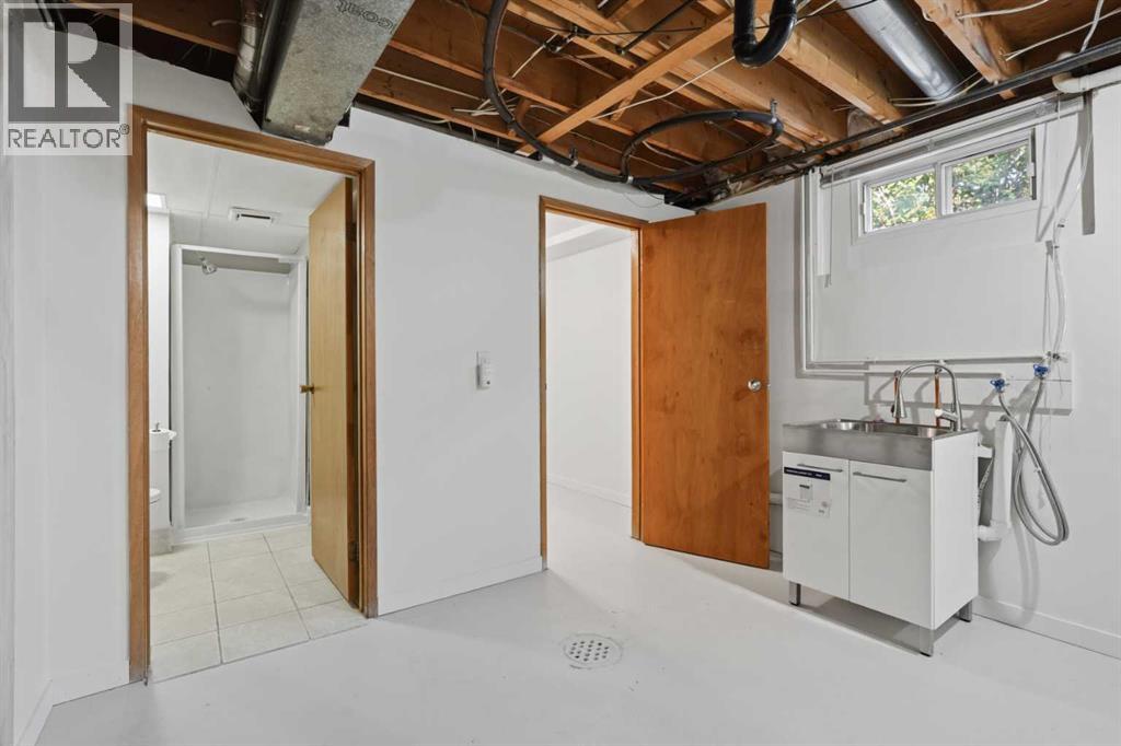 731 Queensland Drive SE, Calgary, Alberta  T2J 4S8 - Photo 37 - A2334302