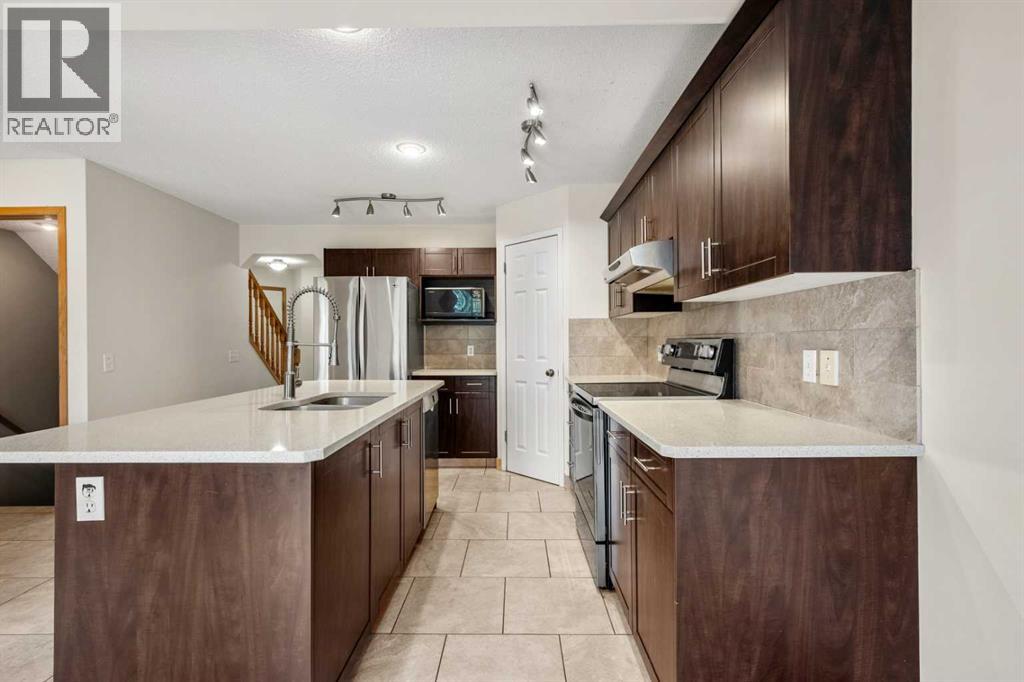 115 Macewan Park Circle, Calgary, Alberta  T3K 4A3 - Photo 11 - A2331751
