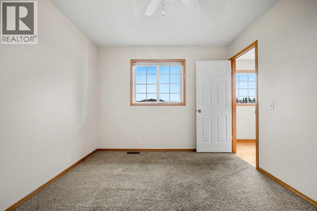 115 Macewan Park Circle, Calgary, Alberta  T3K 4A3 - Photo 25 - A2331751