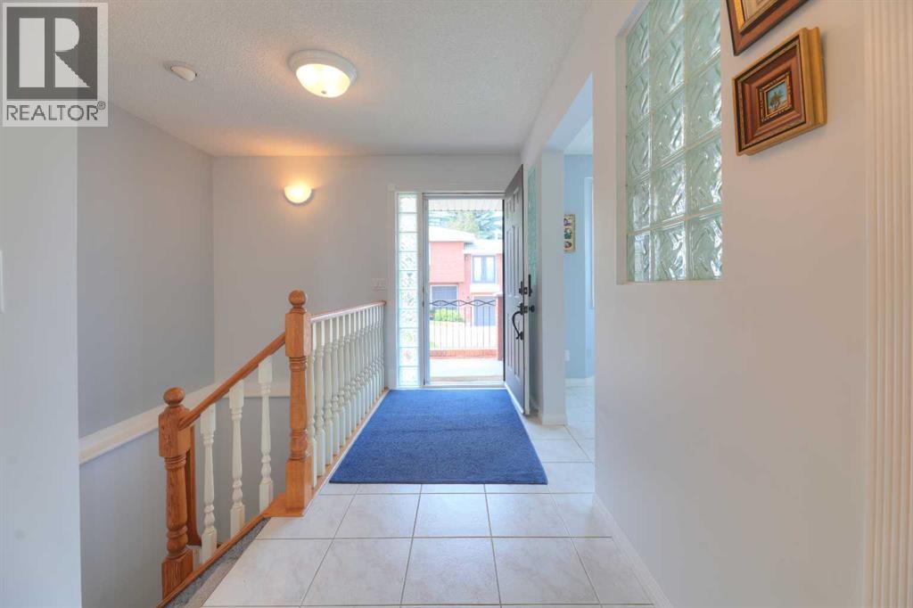8 Prominence Path SW, Calgary, Alberta T3H 2W7 - Photo 3 - A2332354
