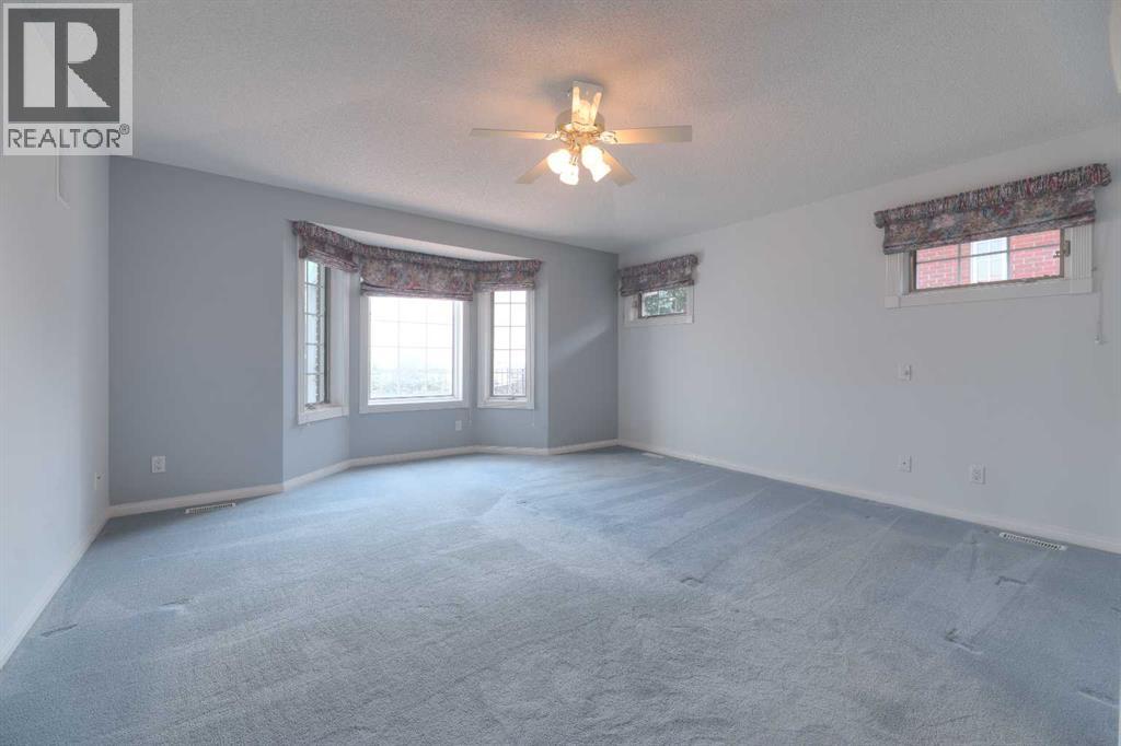 8 Prominence Path SW, Calgary, Alberta T3H 2W7 - Photo 32 - A2332354
