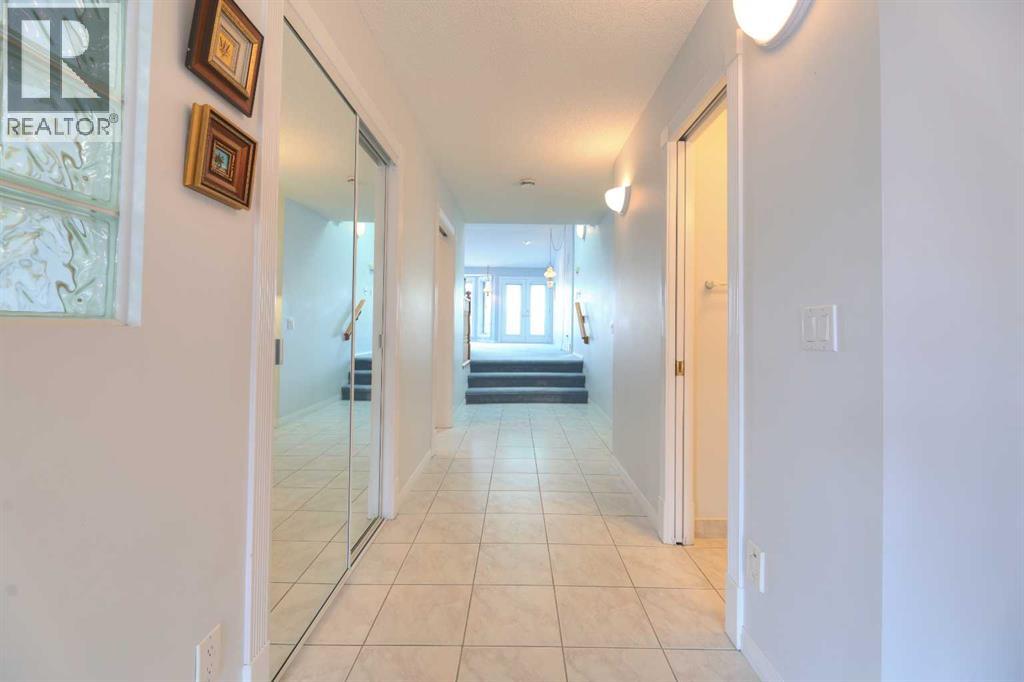 8 Prominence Path SW, Calgary, Alberta T3H 2W7 - Photo 4 - A2332354