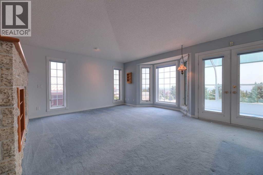 8 Prominence Path SW, Calgary, Alberta T3H 2W7 - Photo 6 - A2332354