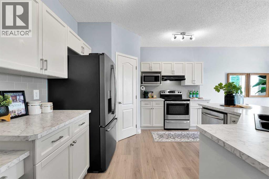 71 Westmount Circle, Okotoks, Alberta  T1S 0B7 - Photo 11 - A2326605